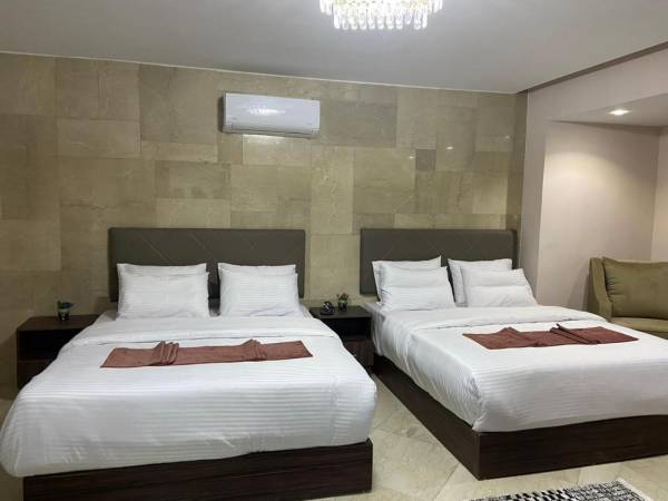 Chambre Quadruple Deluxe